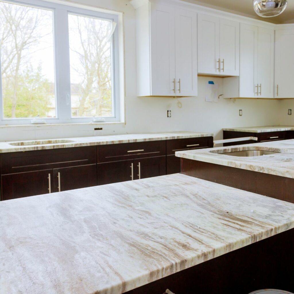 Large center island countertop in dubai kitchen vinyl wrapped in marble film
