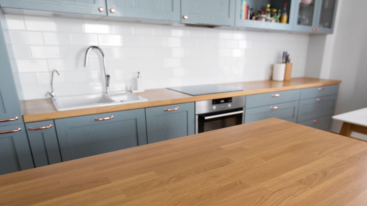 Solid wood vinyl wrapped kitchen countertop in Dubai from aerial view