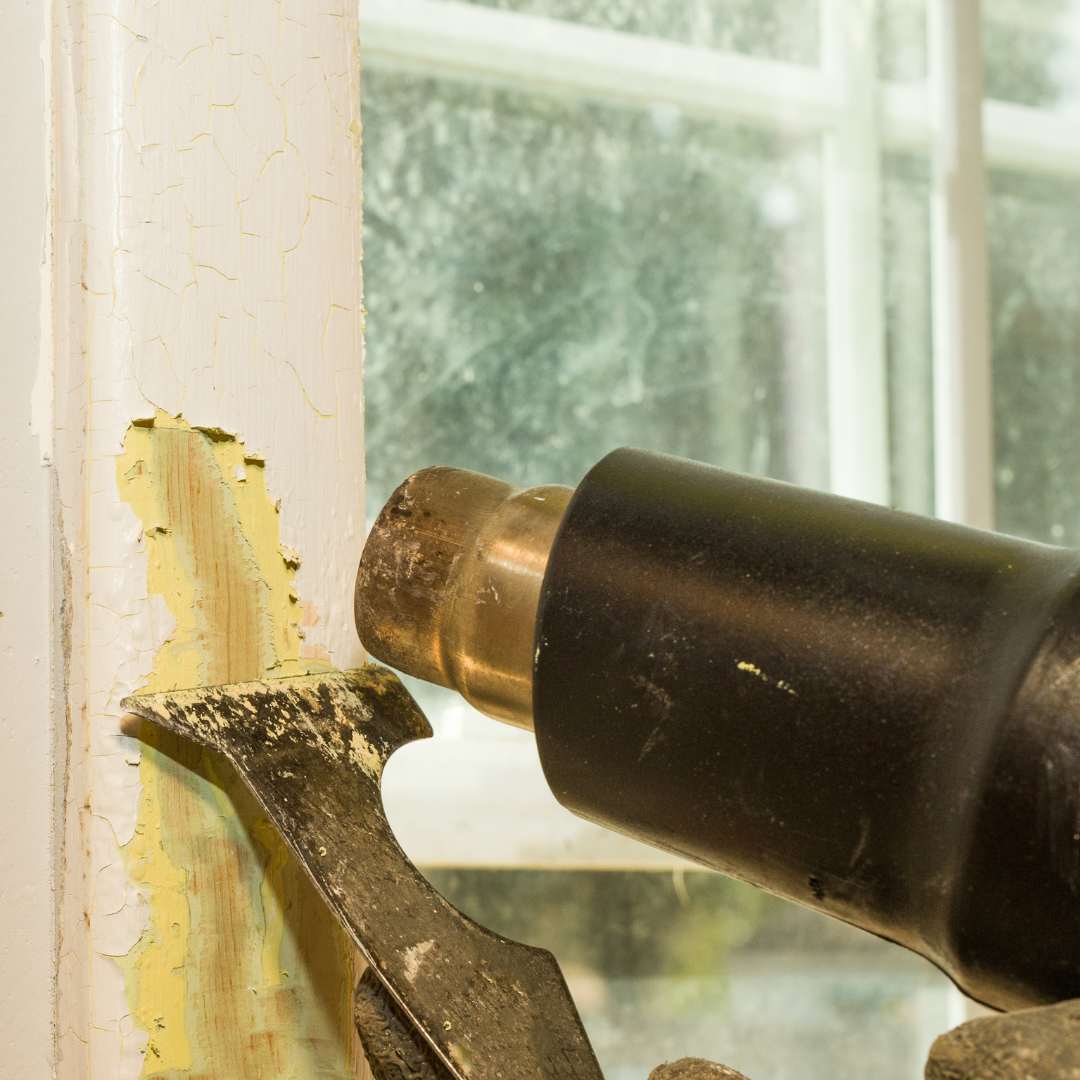 heat gun removing vinyl wrap from kitchen doors