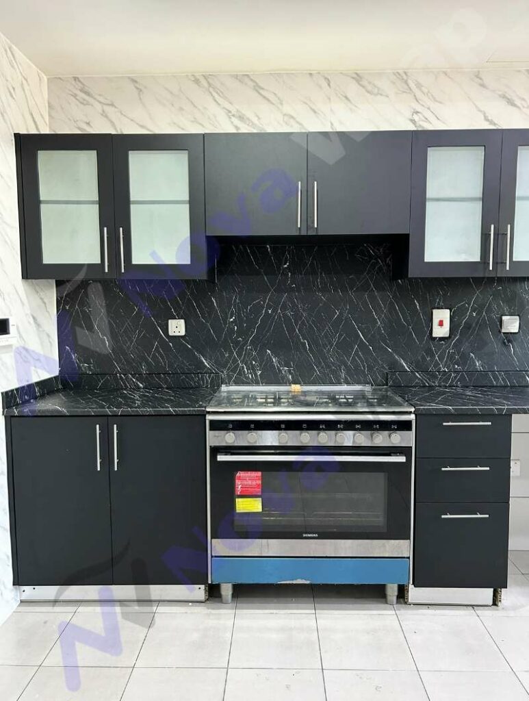 Kitchen cabinets after black vinyl wrap