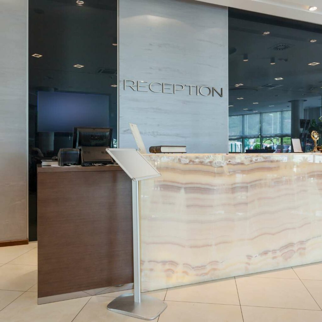 Office reception desk vinyl wrapped in Dubai