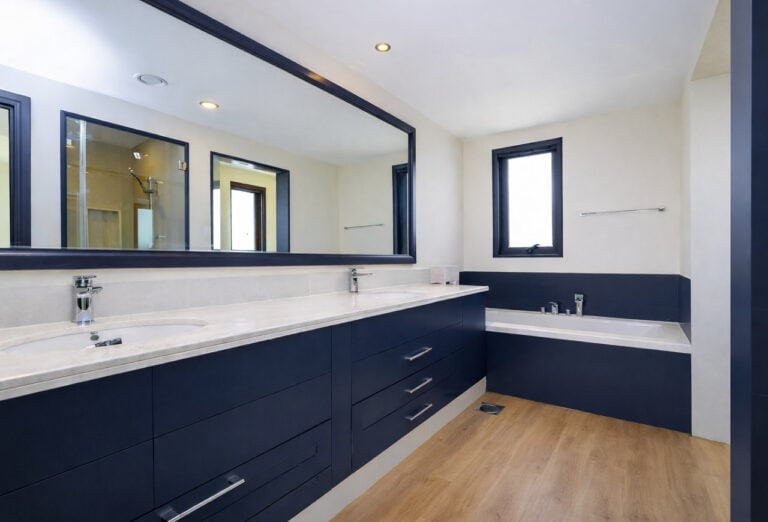Arabian ranches bathroom after wrapping in navy blue