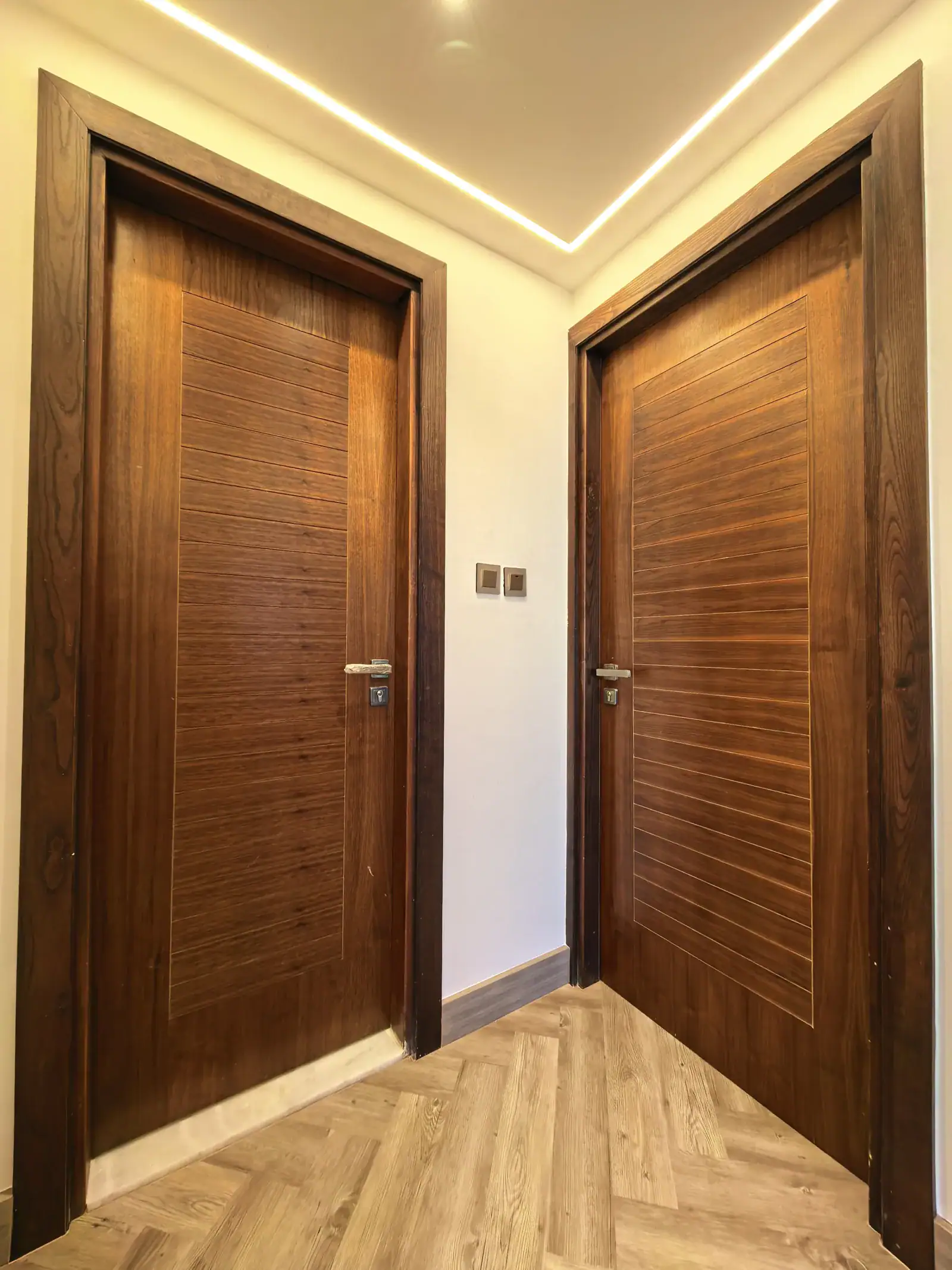 Walnut doors before black vinyl wrapping, Al Sahab Dubai Marina